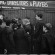 Boys ask for footballers' autographs after a Bolton Wanderers reserve team game at Burnden Park